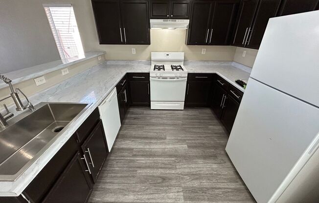 BEAUTIFUL 2 BEDROOM, 2.5 BATHROOM HOME WITH AN ATTACHED GARAGE LOCATED IN A WELL-MAINTAINED COMMUNITY