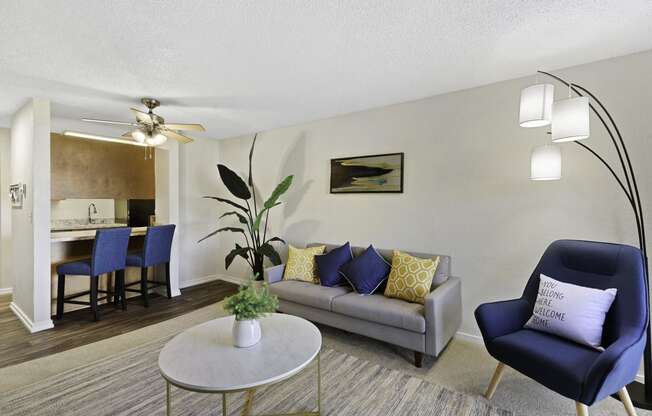 a living room with a couch and a coffee table at Pacific Park Apartment Homes, Edmonds, WA