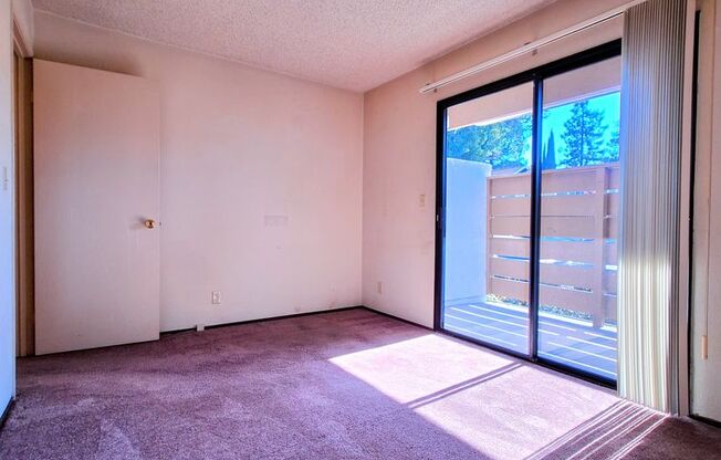 Spacious First Floor 2bd Condo With Laundry In Unit, Pool, Patio, & Carport!