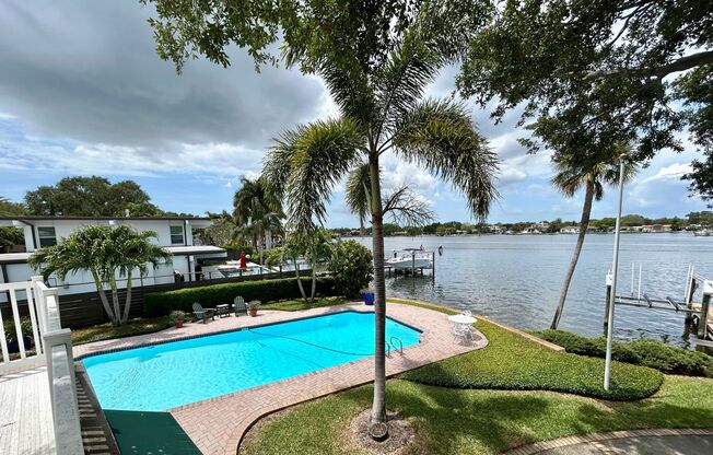 Classic waterfront Snell Isle Estates 3 Bed 2.5 Bath Home with private dock!