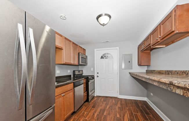 Rehabbed 3Bed/2Bath Condo Unit in Washington Park Available Now!!!