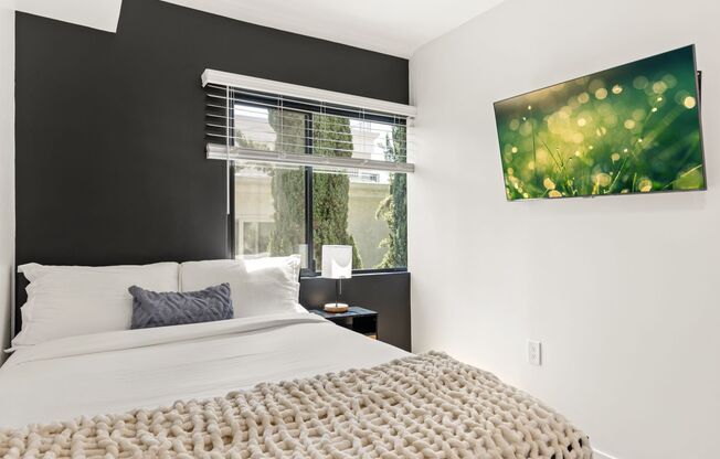 A 4 bedroom, 2 bathroom apartment with common areas and a fully functional kitchen at 1823 Pelham Ave. Unit #7