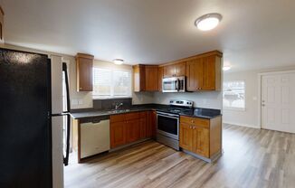 Updated One Bedroom Home For Rent- Fenced Yard, Storage Shed, Washer/Dryer, Generous Parking!