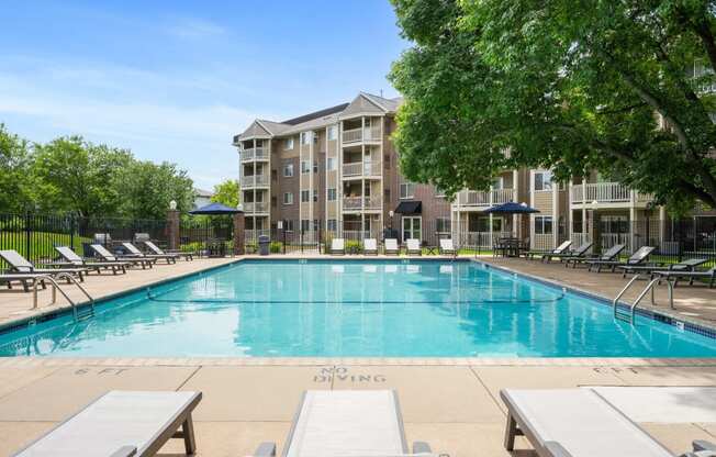 the swimming pool at the preserve at polo towers apartments