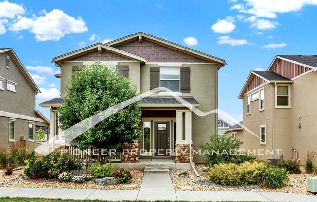 Modern Home in desirable Northgate Colorado Springs with Central AC, ENCLOSED yard and 2-car Garage!