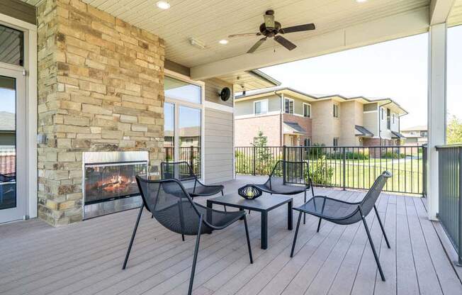 Outdoor fireplace with seating at Villas of Omaha in northwest Omaha NE 68116
