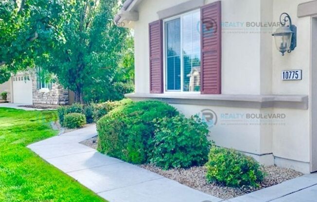 Step into this stunning single-story Damonte Ranch abode!