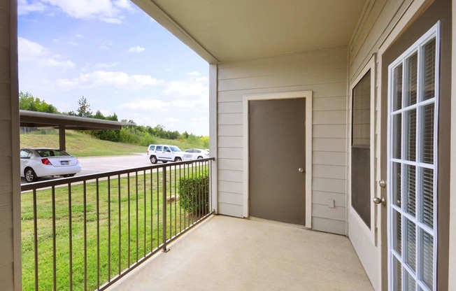 Covered Patio with Storage Facility at Stoneleigh on Cartwright Apartments, J Street Property Services, Mesquite,Texas