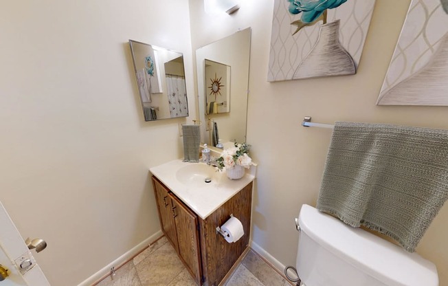 a bathroom with tiled flooring