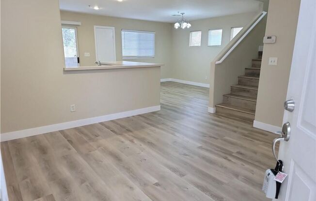 Located in Gated Community of Nob Hill. Rich Wood laminate & tile flooring throughout living area