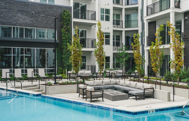 Experience paradise every day with Modera Germantown's lavish pool deck, complete with a captivating outdoor fire pit.