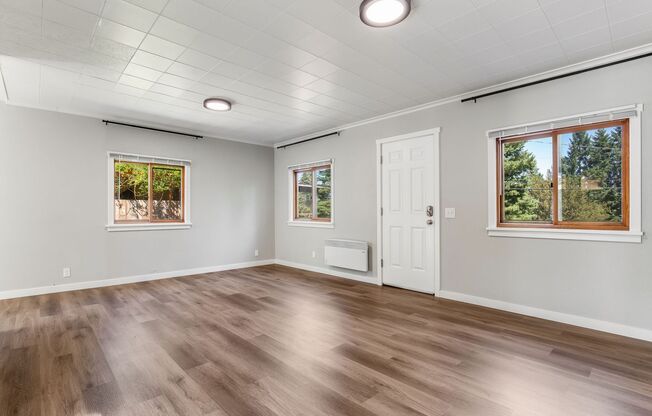 Charming 1 BD 1 BA cottage nestled on a beautifully landscaped lot