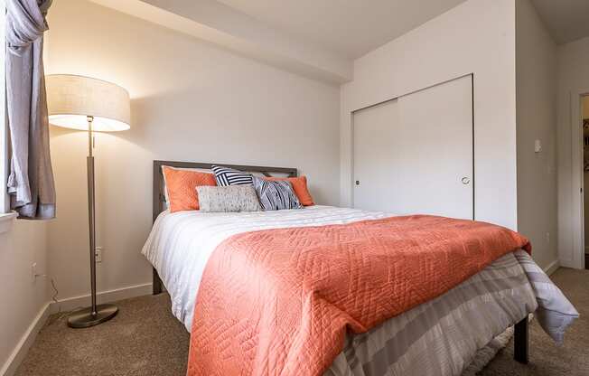 bedroom with large bed and closet