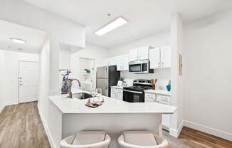 barstools at white kitchen counter