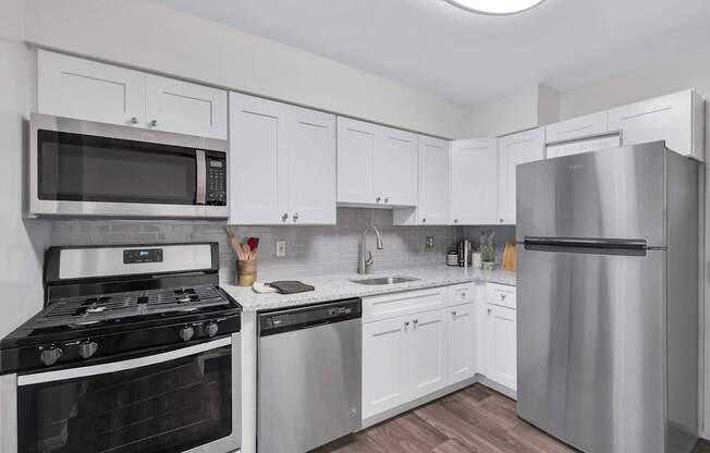 Modern Kitchen With Stainless Steel Appliances And Double Door Refrigerators at Columbia Pointe, Columbia, MD, 21045