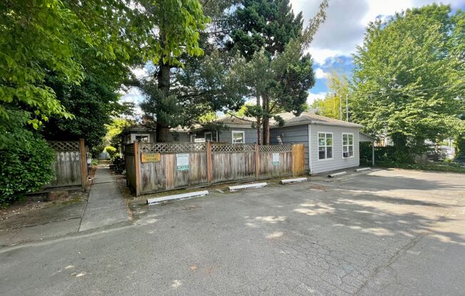 Spacious One Bedroom in Quiet 5 Plex with Courtyard Setting~ Open Floor Plan~ Great Shared Outdoor Space~ Off Street Parking!