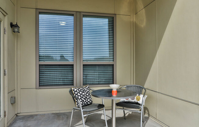 Table chair at Residences at The Streets of St. Charles, Missouri, 63303