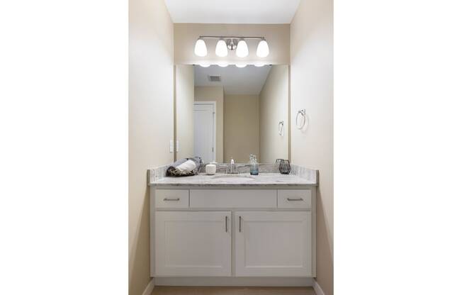 Bathroom vanity at The Liberty Apartments and Townhomes in Golden Valley Minnesota
