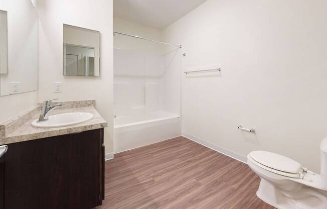 a bathroom with hard-surface flooring