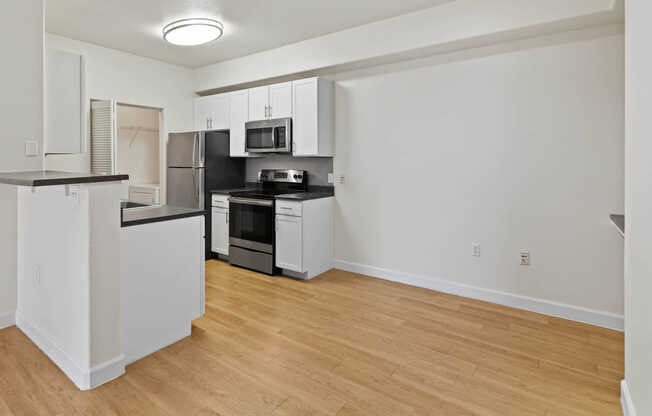 Kitchen and Dining Room with Hard Surface Flooring