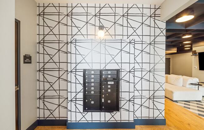 a wall in a room with a black geometric pattern on it at EagleRidge Plaza Residences, North Dakota, 58104