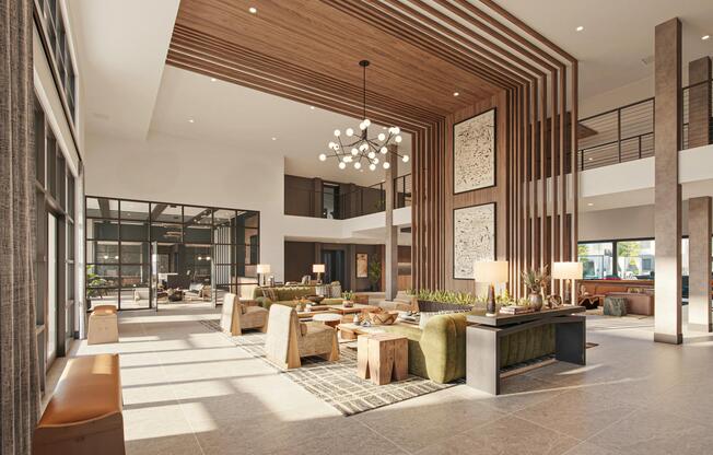 A light-filled lobby welcomes you home with wood detailing, layered seating, and expansive gathering spaces.