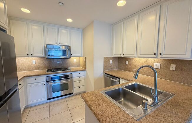 Sleek 2-Bed with a Den/Office + Flex Corner Condo with Attached Tandem Garage