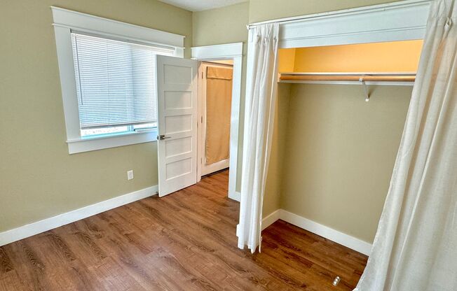 Portsmouth Neighborhood Updated 3-Story Home with Spacious Yard, Finished Basement, LVP Flooring