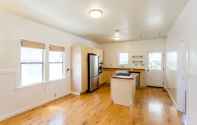 Charming 2 Bedroom House with Expansive Workshop Garage