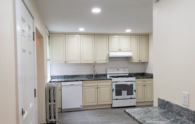 4 bed 2 bath w HT/HW Included and near the T!