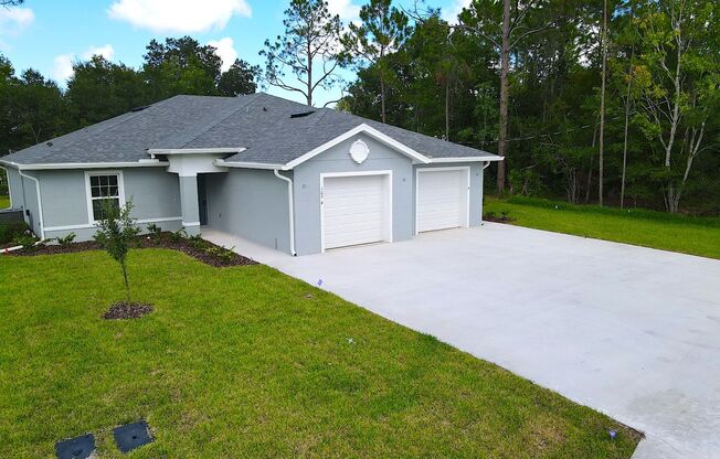 Roomy 3 Bed 2 Bath Duplex Home for Rent w Screened Lanai in Palm Coast!