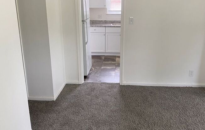 Freshly painted 3 bedroom, 1 1/2bath ranch with basement and garage