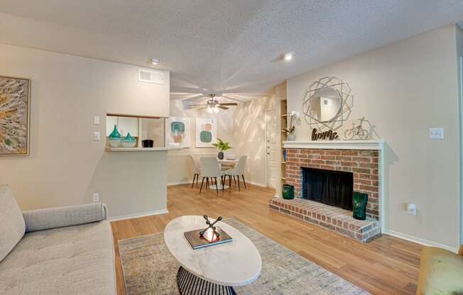 Living Room With Fireplace at Indian Creek Apartments, Texas, 75007