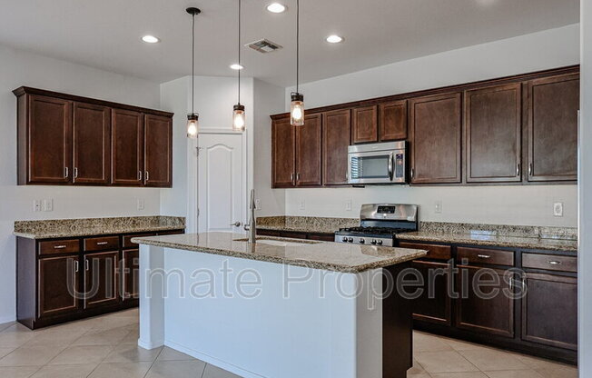 12016 W DESERT SUN LN