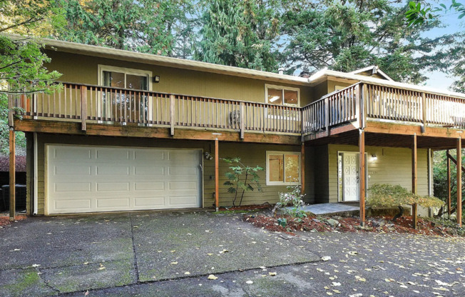 Great Lake Oswego Home with Wrap-around Deck is Located in the Sought-after Hallinan Neighborhood!