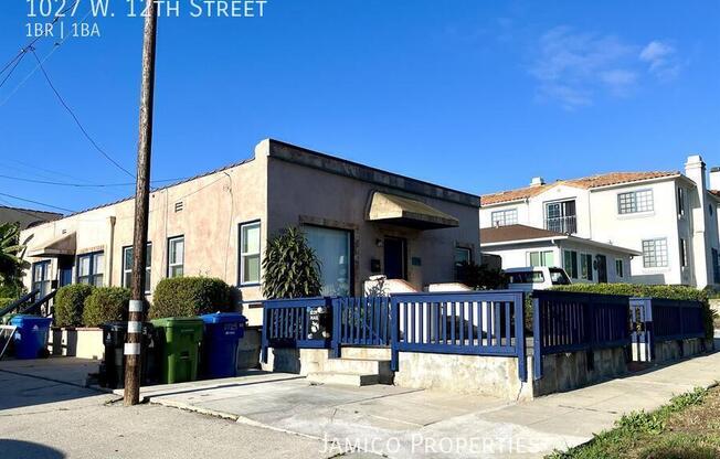 1027 W 12 ST