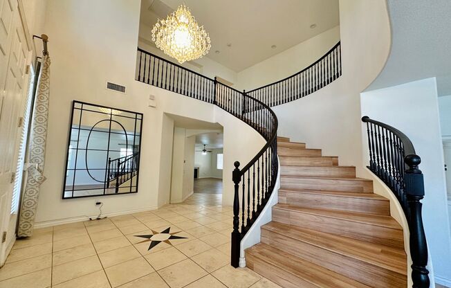 Stunning home in a guard gated community inside Rhodes Ranch with tons of community amenities. Almost 5,000 sq ft home with 3-car garage, 4 bedrooms with 4.5 bathrooms. Huge loft upstairs.