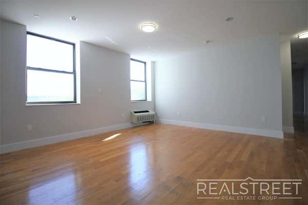 90-02 Queens Blvd