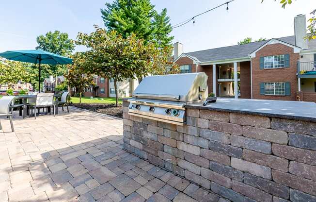 grilling station and dining area out Littlestone Apartments building in Gallatin