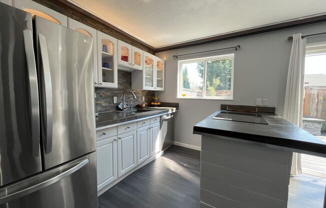 Charming 3-Bedroom Home with Custom Craftsmanship & Outdoor Retreat