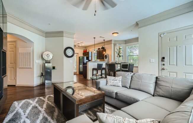 a living room with a couch and a table