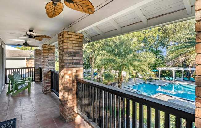 Balcony overlooking pool and sundeck