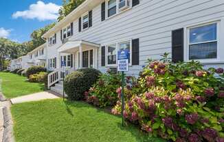 a white apartment with pretty flowers at Fox Hill Commons, Connecticut, 06066