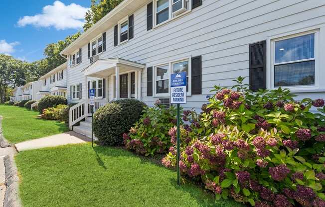 a white apartment with pretty flowers at Fox Hill Commons, Connecticut, 06066