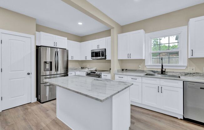 This beautifully updated single-story 4 bedroom home sits on an large lot and is packed with high end features