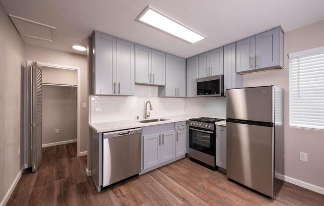a stainless steel refrigerator in a kitchen
