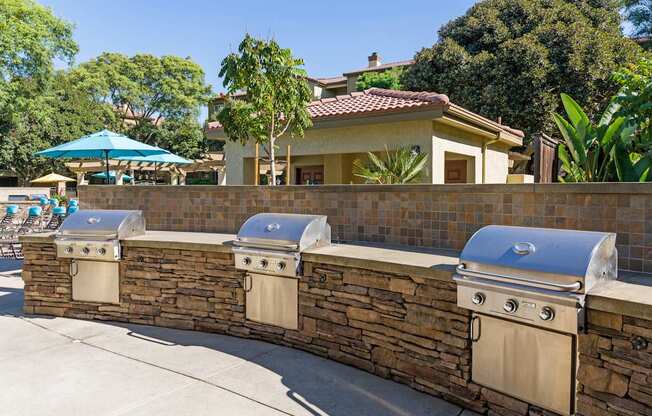 A wall of grills at Legacy Apartments