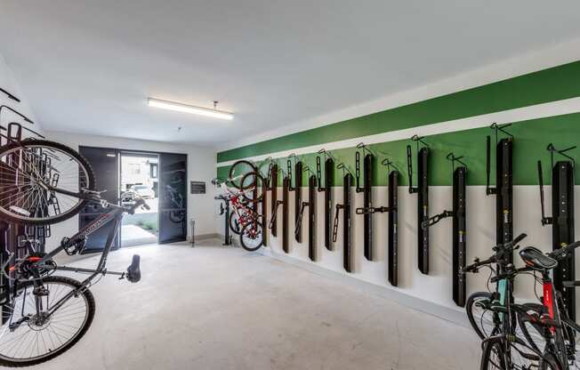 A bike rack with many bikes parked.