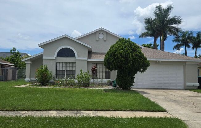 Beautiful 4 Bed / 2 Bath Single-Family Home with Fenced Yard & Screened Patio
