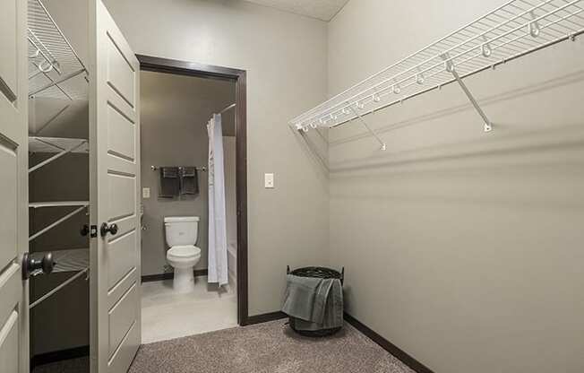 Large walk in closet providing plenty of storage space at North Pointe Villas